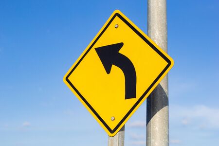 beware curve road sign on sky background