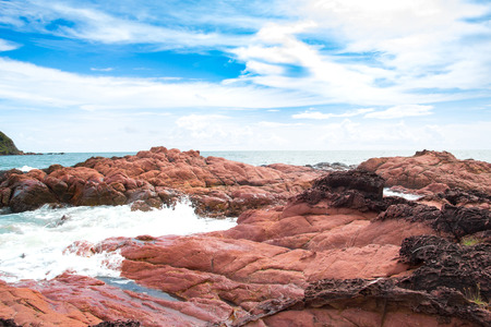 Pink stone (Arkose) near the beach , Waves hit the pink stone , Pink stone viewpoint , CHANTHABURI THAILANDの写真素材