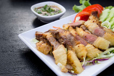 Grilled beef steak sliced with source , Thai Foodの写真素材