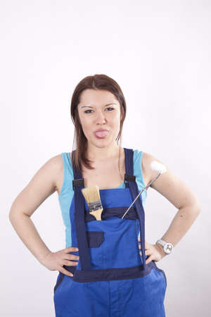 Young beautiful girl painter fooling around.の写真素材