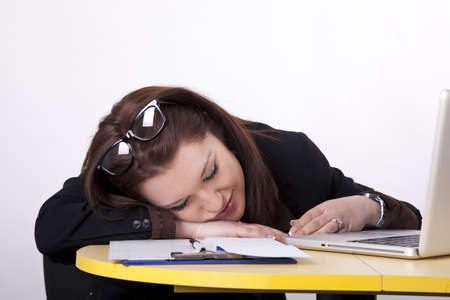 Young beautiful woman at the office working.