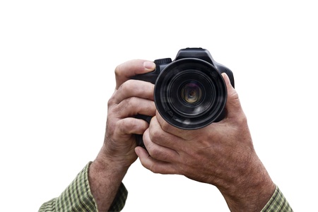 two hands holding a camera isolated on white の写真素材