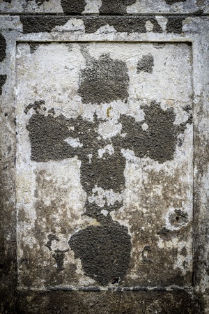 faded cross  on an old parget wall.の写真素材