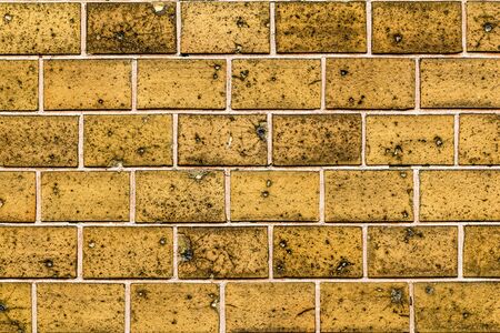 Old brick wall pattern closeup.の写真素材