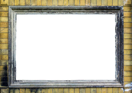 vintage stuccoframe  isolated on white with yellow bricks around の写真素材