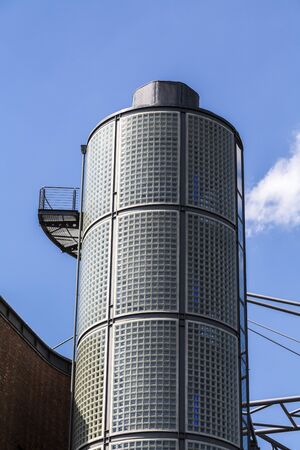outdoor round staircase with glass stones on blue sky.の写真素材
