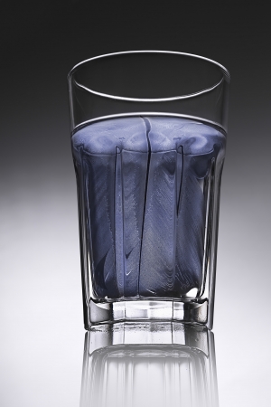 simple water-glass with structured water in blue.の写真素材
