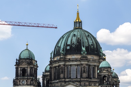 detail of the berliner dom with building crane の写真素材