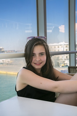 lucky teenage girl traveling with a ferry.の写真素材