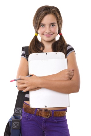 teenage girl with clipboard and pencil smiling, isolated on white.の写真素材