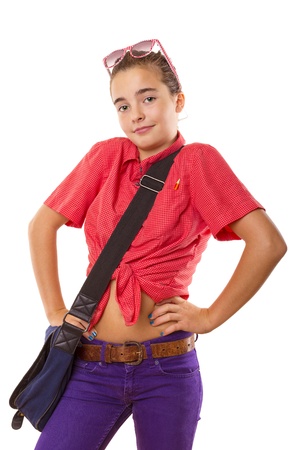 smiling teenage girl with bag and sunglasses shrugs her shoulders, isolated on white.の写真素材