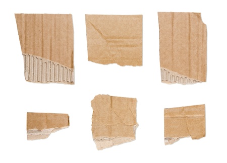 collection of ripped  brown pieces of cardboard isolated on white.の写真素材