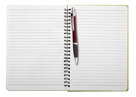 used blank note book with ring binder and ball pen, isolated on white.の写真素材