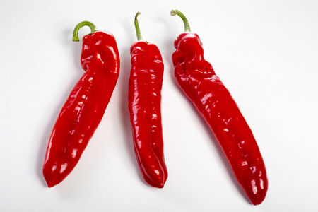 a group of red bell peppersの写真素材