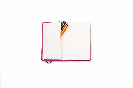 blank open diary with two pens in side pocket, isolated on white.の写真素材