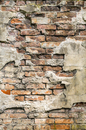 close up of an old grunge brick wall, background.の写真素材