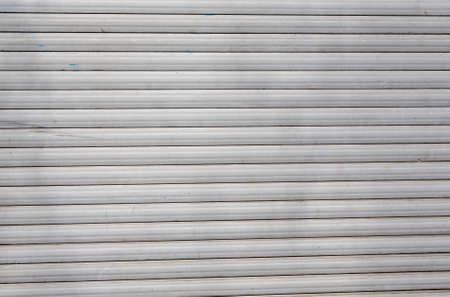 dirty old roller shutter for backgrounds.