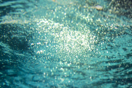 blurred bubbles under water for backgroundsの写真素材