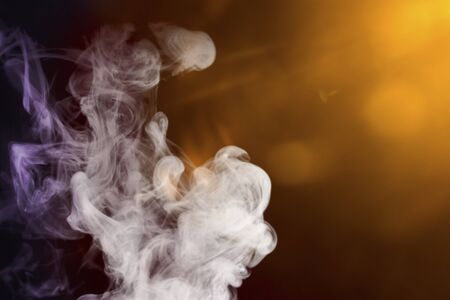 smoke with colored lights for compositions and overlaysの写真素材