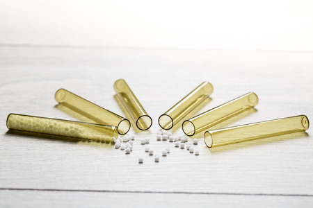 some small glass tubes with homeopathy globulesの写真素材