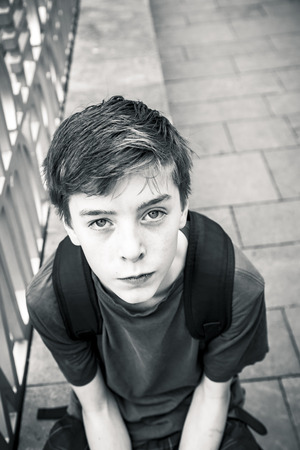 black and white portrait of a teenage boyの写真素材