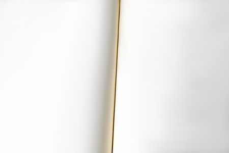 two white blank pages of an open bookの写真素材