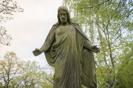 old sculpture of jesus in a park. Unknown artist of the 19th.の写真素材