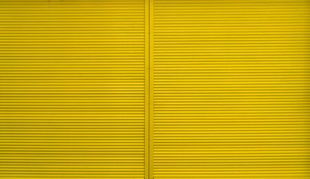 simple yellow house facade in Berlin Kreuzbergの写真素材