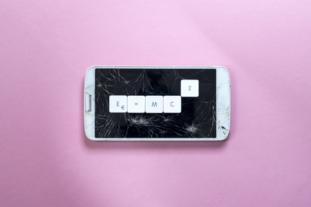the description of Entropy with the famous formula on a broken mobile phoneの写真素材