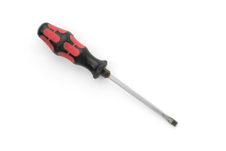 slot screwdriver with black and red handle, isolated on white