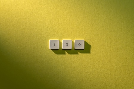 description of the word Ego on yellow backgroundの写真素材