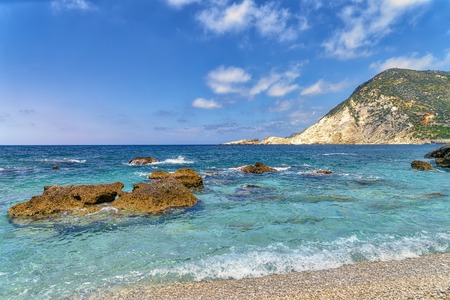 mediterranean landscape with stone beach in summerの写真素材