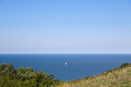 small sailboat on the baltic sea, HIddensee Island Germanyの写真素材