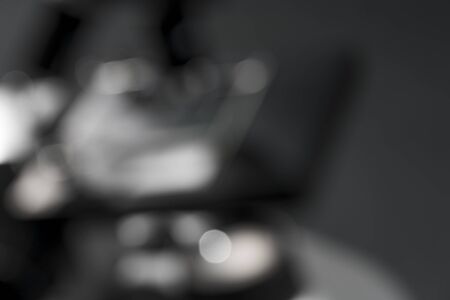 blurred shot of a microscope, for backgrounds and overlaysの写真素材