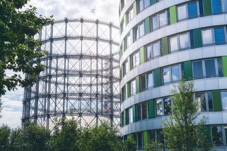 old gas storage and modern house found in Berlinの写真素材