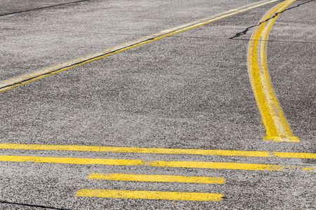 road marking and signs on an old airstripの写真素材