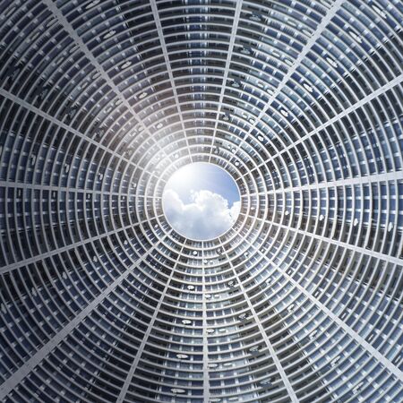 Composition, courtyard of a skyscraper with satellite dishesの写真素材