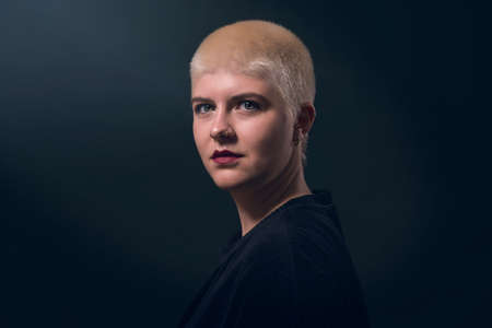 portrait of a beautiful young woman with short blonde hairの写真素材