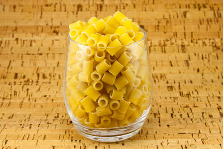 Ditalini pasta inside transparent glassの写真素材
