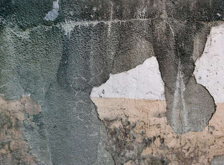 Old wall background close up. concrete wall texture . Textured stone sandstone surface.の写真素材