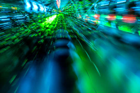 Defocused Image abstract background of moving colorful lights.
