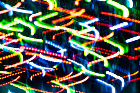 Defocused Image abstract background of moving colorful lights.の写真素材