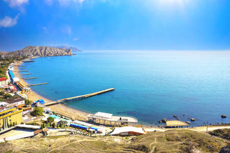 Panoramic photo of the sea and mountains from aboveの写真素材