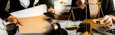 Justice and law concept.Male judge in a courtroom with the gavel, working with, computer and docking...