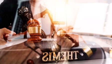Business and lawyers discussing contract papers with brass scale on desk in office. Law, legal...