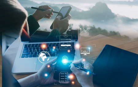 Online transactions, Businessman touching fingerprint scan provides security interface payment...