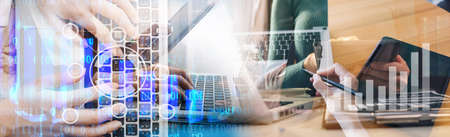 Businessman and team analyzing financial statement Finance task. with smart phone and laptop and...