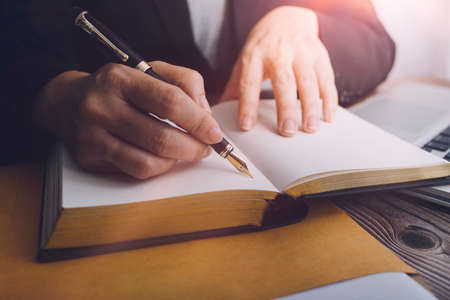 Business and lawyers discussing contract papers with brass scale on desk in office. Law, legal...