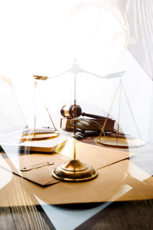 Business and lawyers discussing contract papers with brass scale on desk in office. Law, legal...