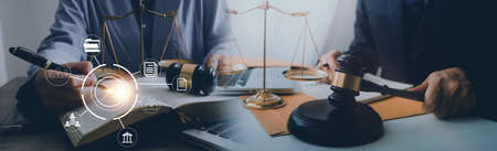 Justice and law concept. Gavel on sounding block in hand's Male judge at a courtroom, working with...